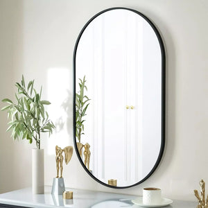 Miroir mural ovale noir.