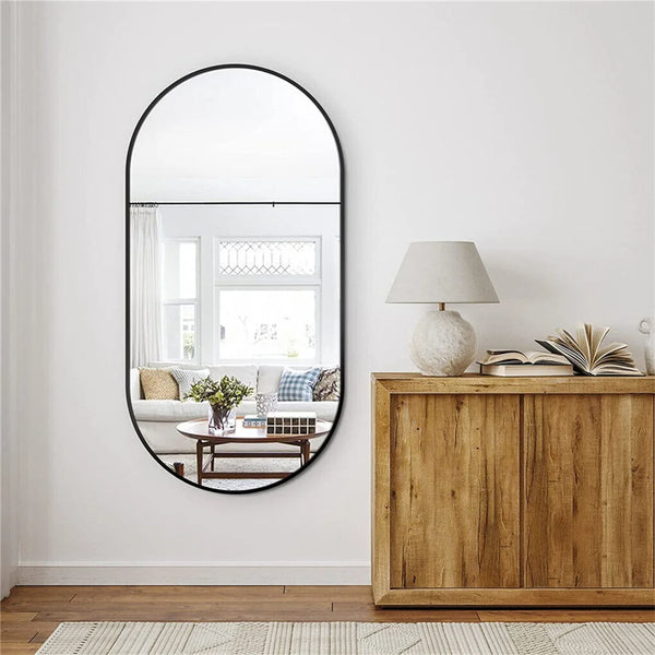 Miroir mural ovale noir.