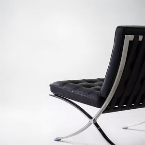 Lounge Chair &amp; Footstool – Black Genuine Leather &amp; Sculptural Chrome Frame