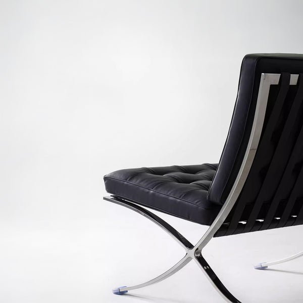 Lounge Chair &amp; Footstool – Black Genuine Leather &amp; Sculptural Chrome Frame